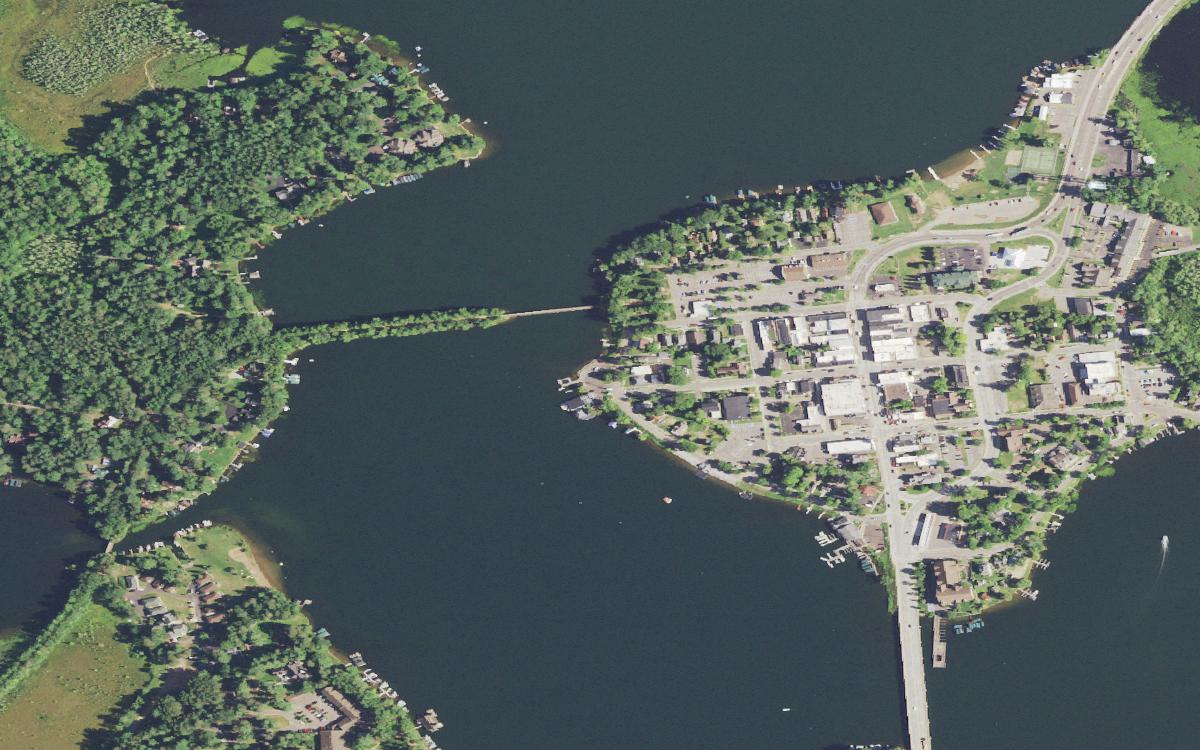 Aerial view of the west end of Lake Minocqua along West Park Avenue, where the Aqua Bowl ski show grounds sit on the shore