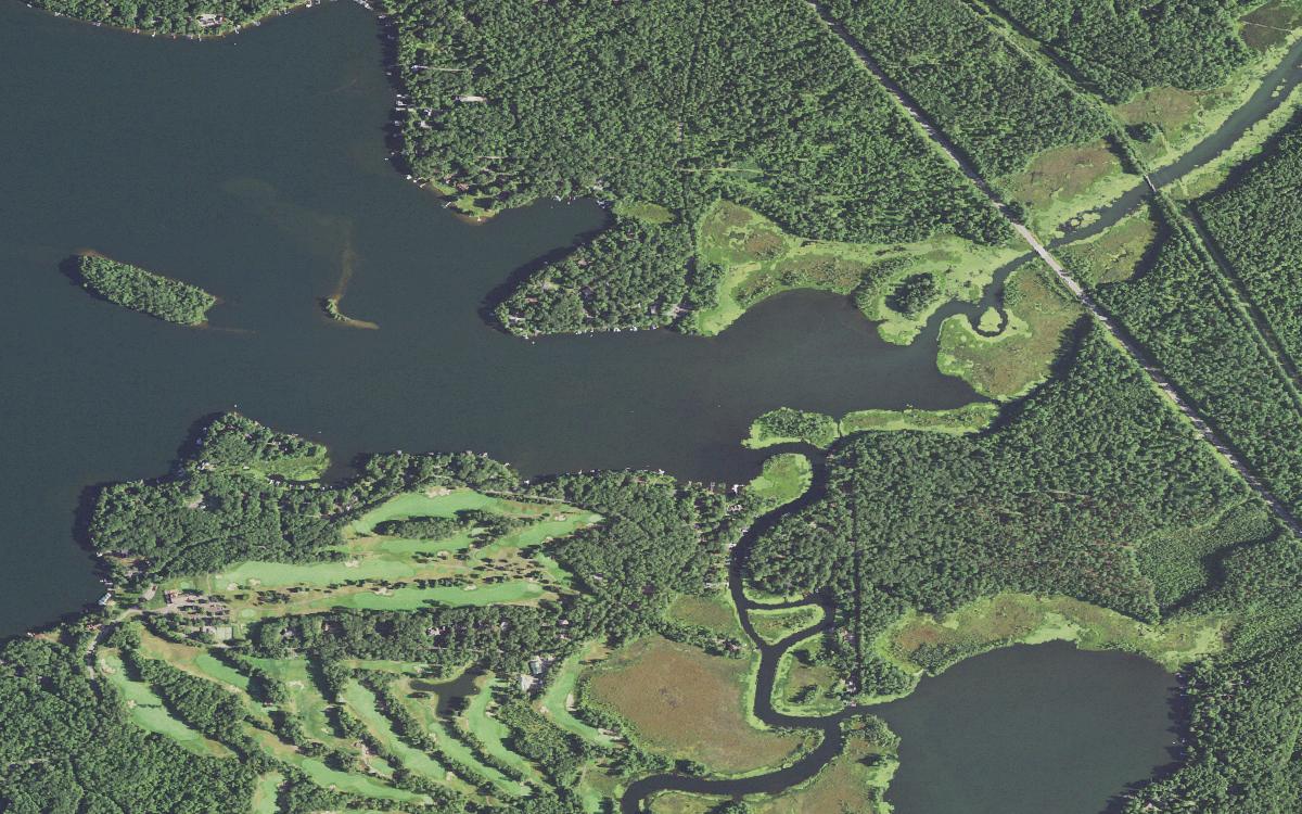 Aerial view of the east end of Lake Minocqua and the winding thoroughfare channel leading south toward Lake Tomahawk