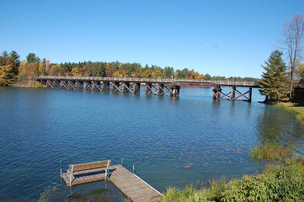 The old railroad trestle carrying the Bearskin State Trail across Lake Minocqua, photographed in autumn