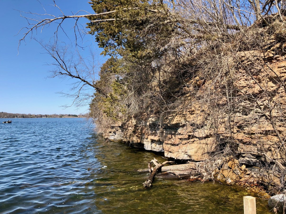 Rock shelf and clear shallow water along the Green Lake shoreline at Lone Tree Point